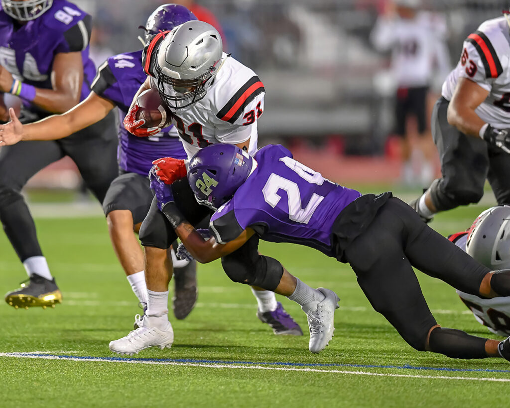 High School Football player in action during a game in South Tex